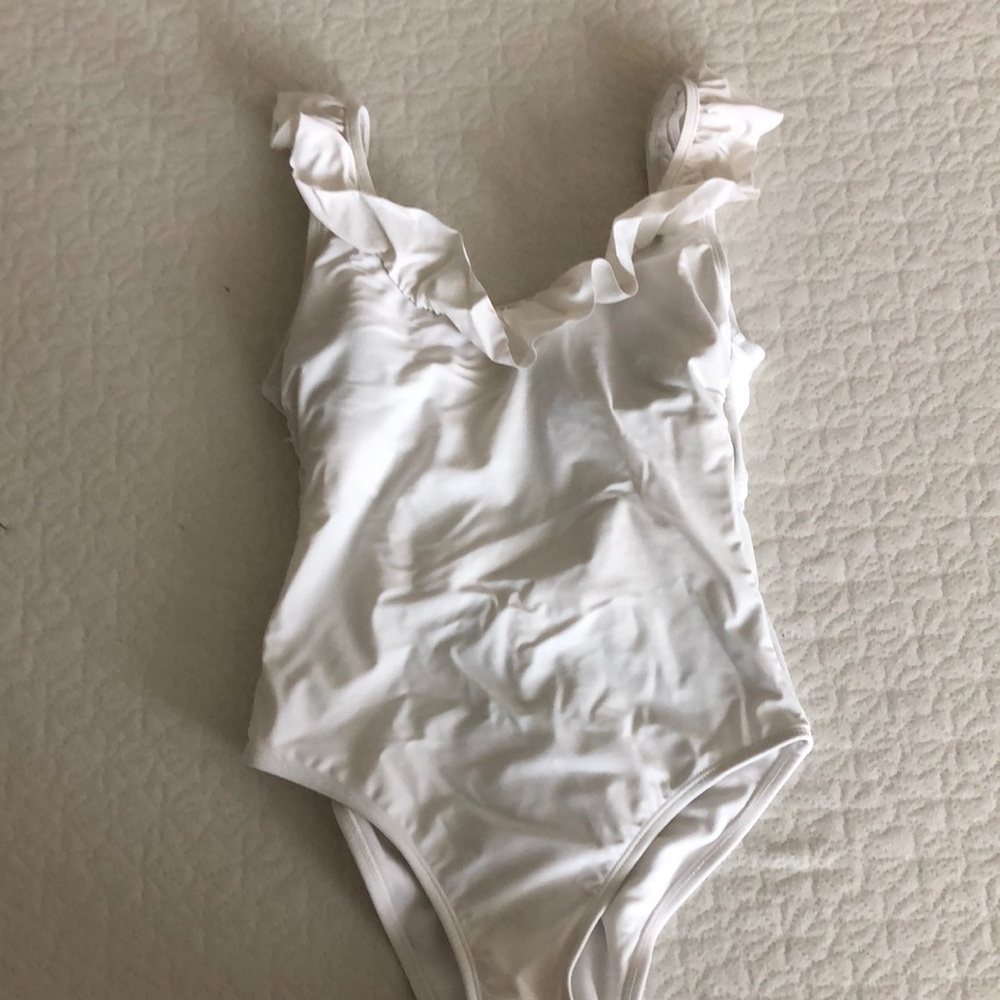 White bathing suit doesn’t fit my chest!